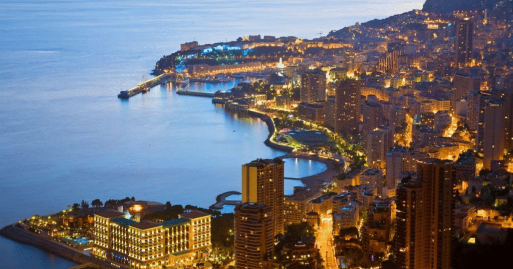 City lights glowing along a beautiful coastal shoreline